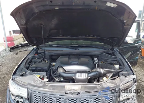 2014 Jeep Grand Cherokee Overland z USA, uszkodzony, nr VIN 1C4RJFCG4EC355890